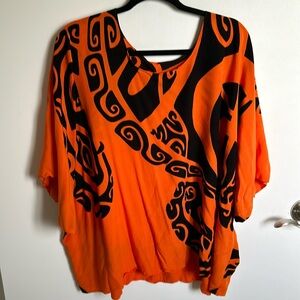 Orange and black tribal print blouse